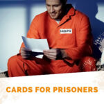 Man in prison reading. Text is Cards for Prisoners